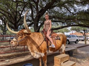 Anna on the bull, Fort Worth Texas stockyards, day 10